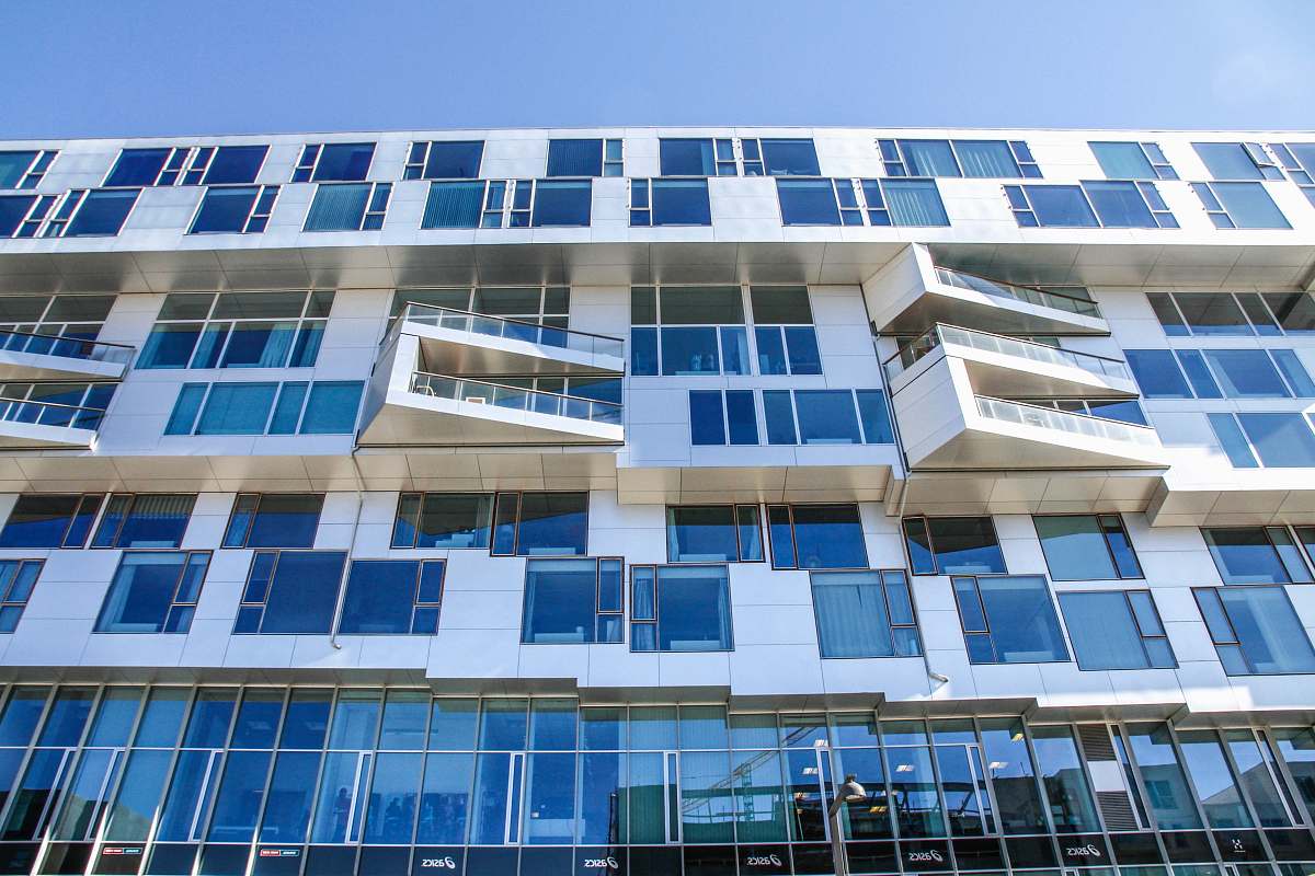 city white and gray metal and glass building high rise