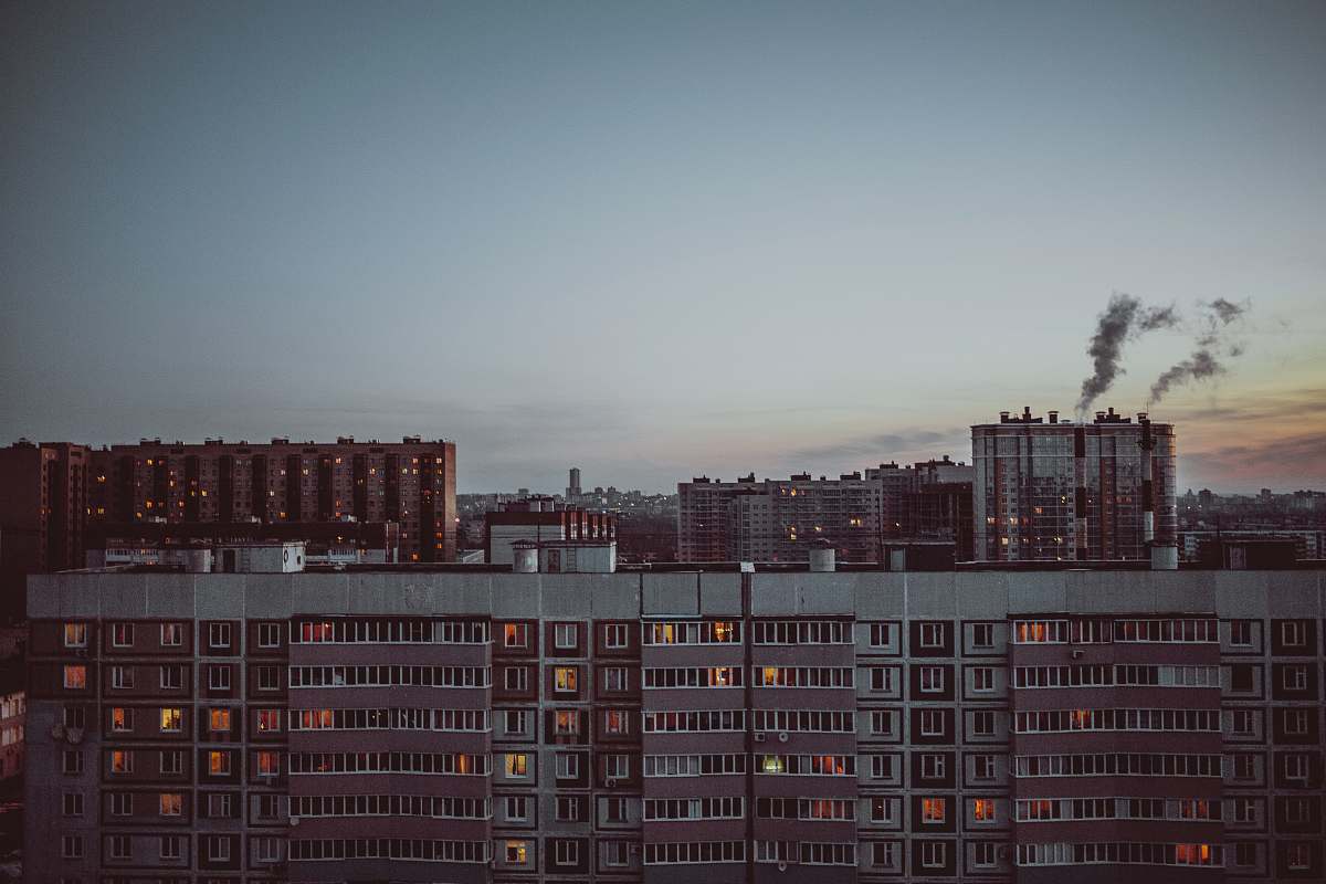 city white and maroon building high rise