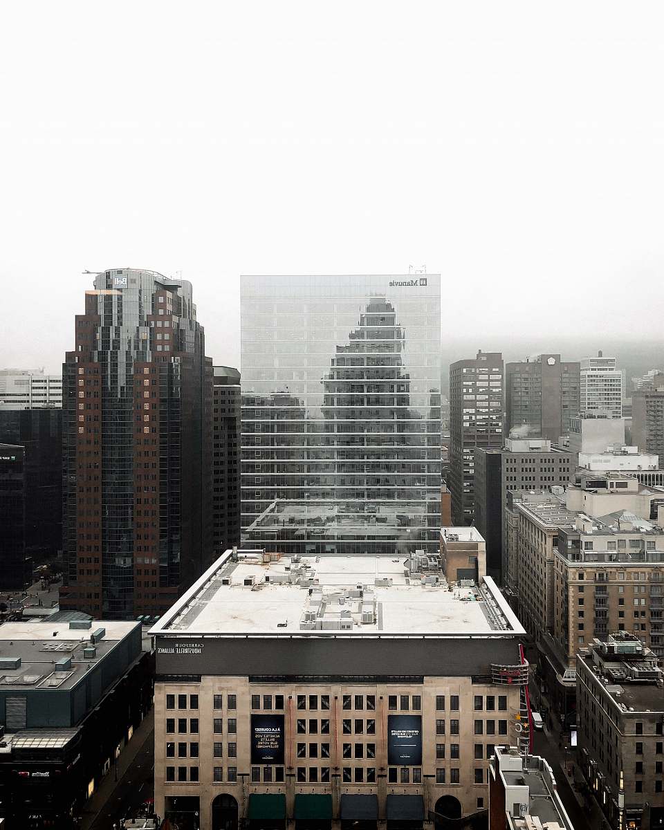 city white clouds over buildings urban