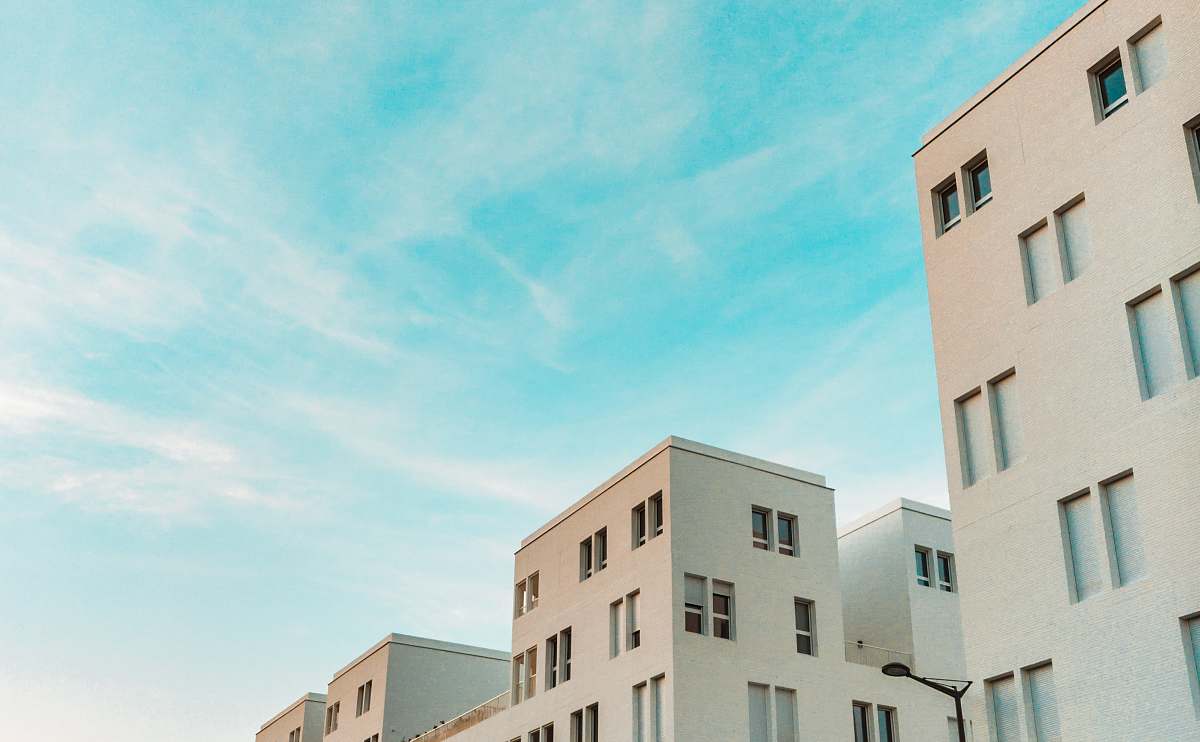 condo white concrete apartment during daytime housing
