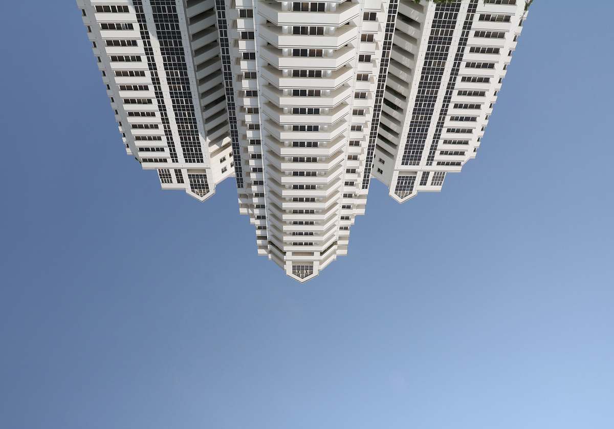 city white concrete building at daytime high rise