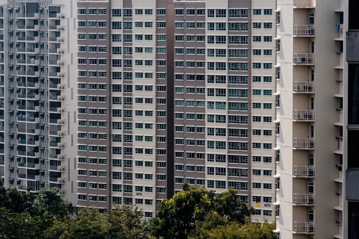 condo white concrete building at daytime housing