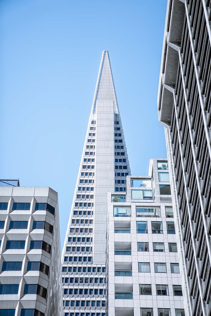 city white concrete building at low angle photography urban
