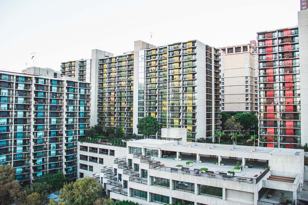 housing white concrete buildings during daytime condo