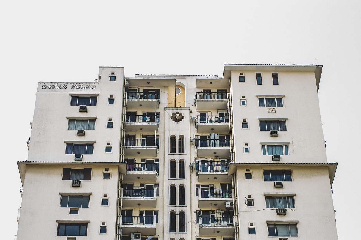 city white high-rise building during daytime high rise