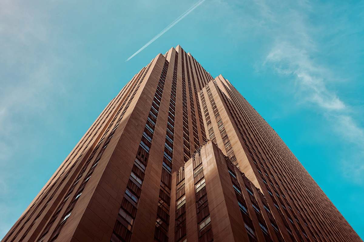 architecture worm's eye view of brown building skyscraper