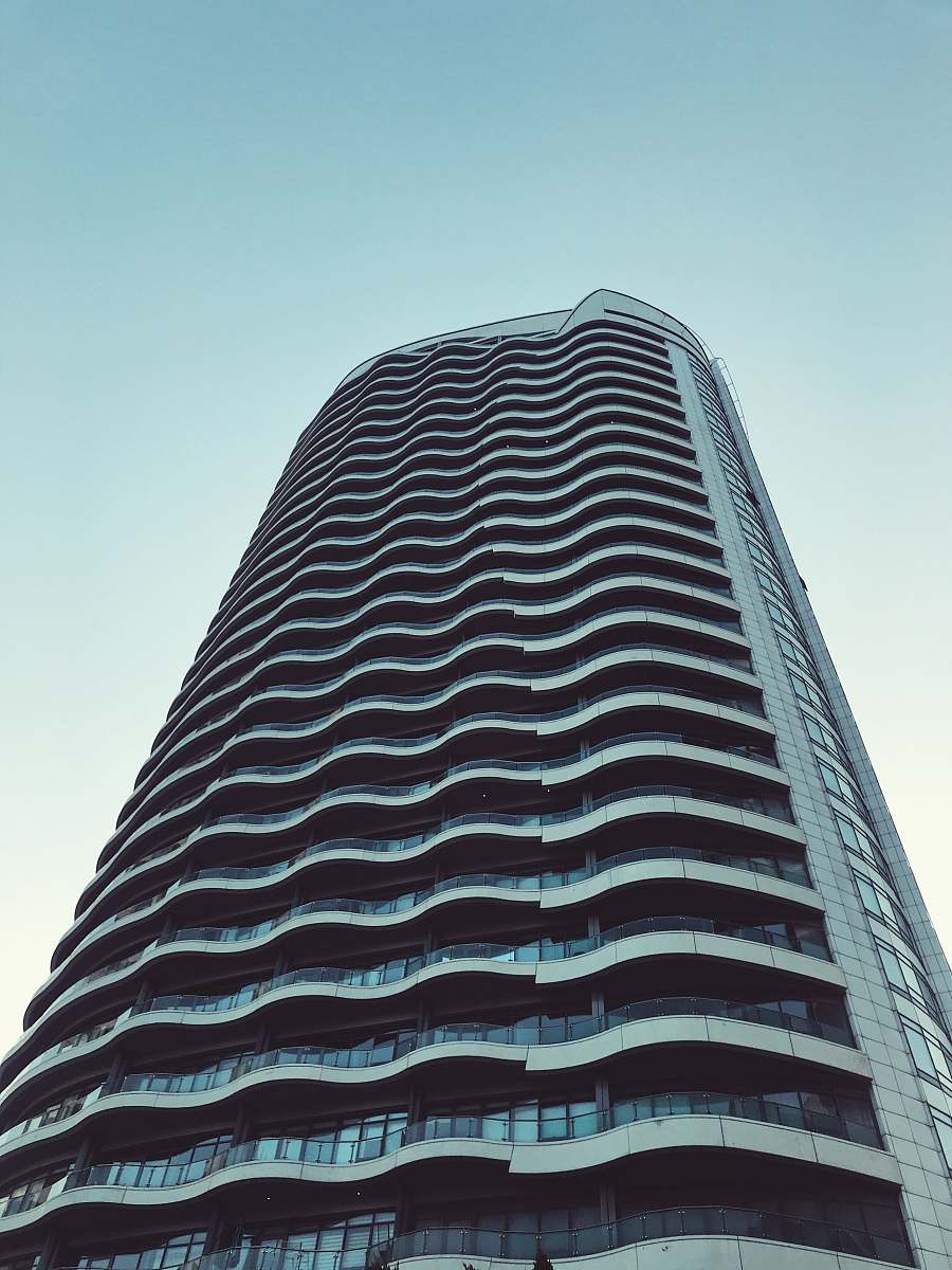 city worms-eye view of gray tall building high rise