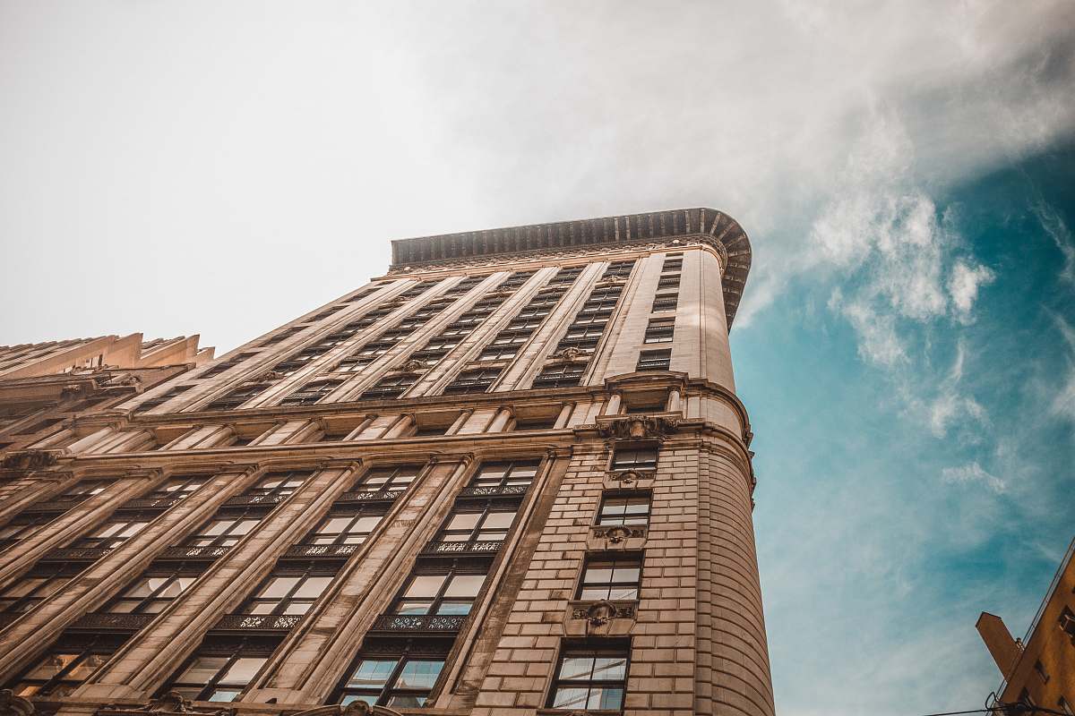architecture worm's eye view photography of brown building skyscraper