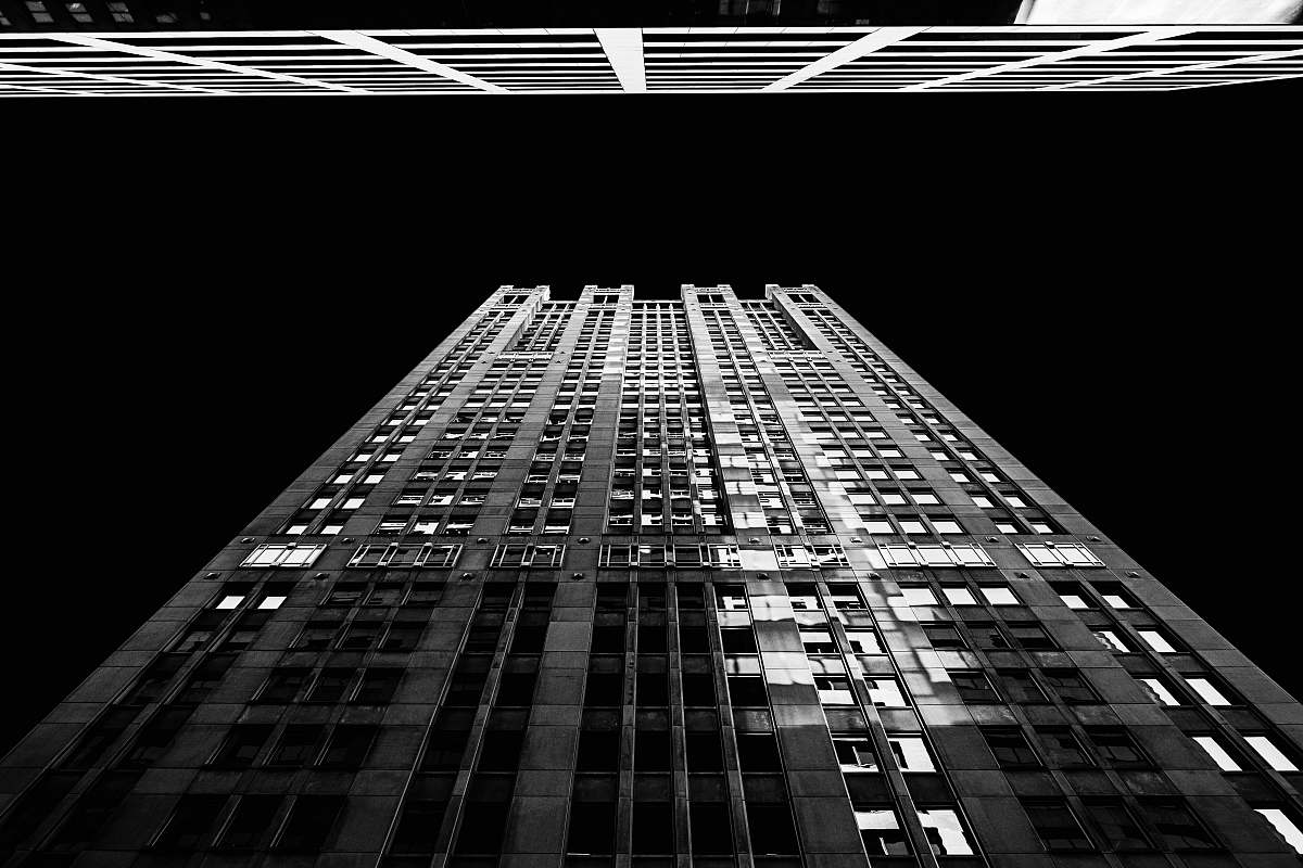 black-and-white worm's eye view photography of building architecture