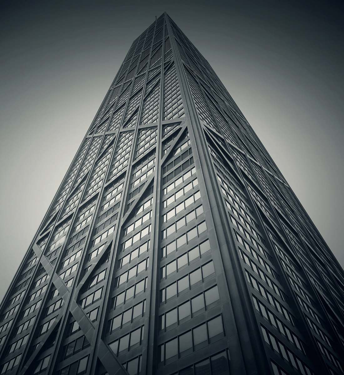 skyscraper worm's eye-view photography of gray high-rise building architecture