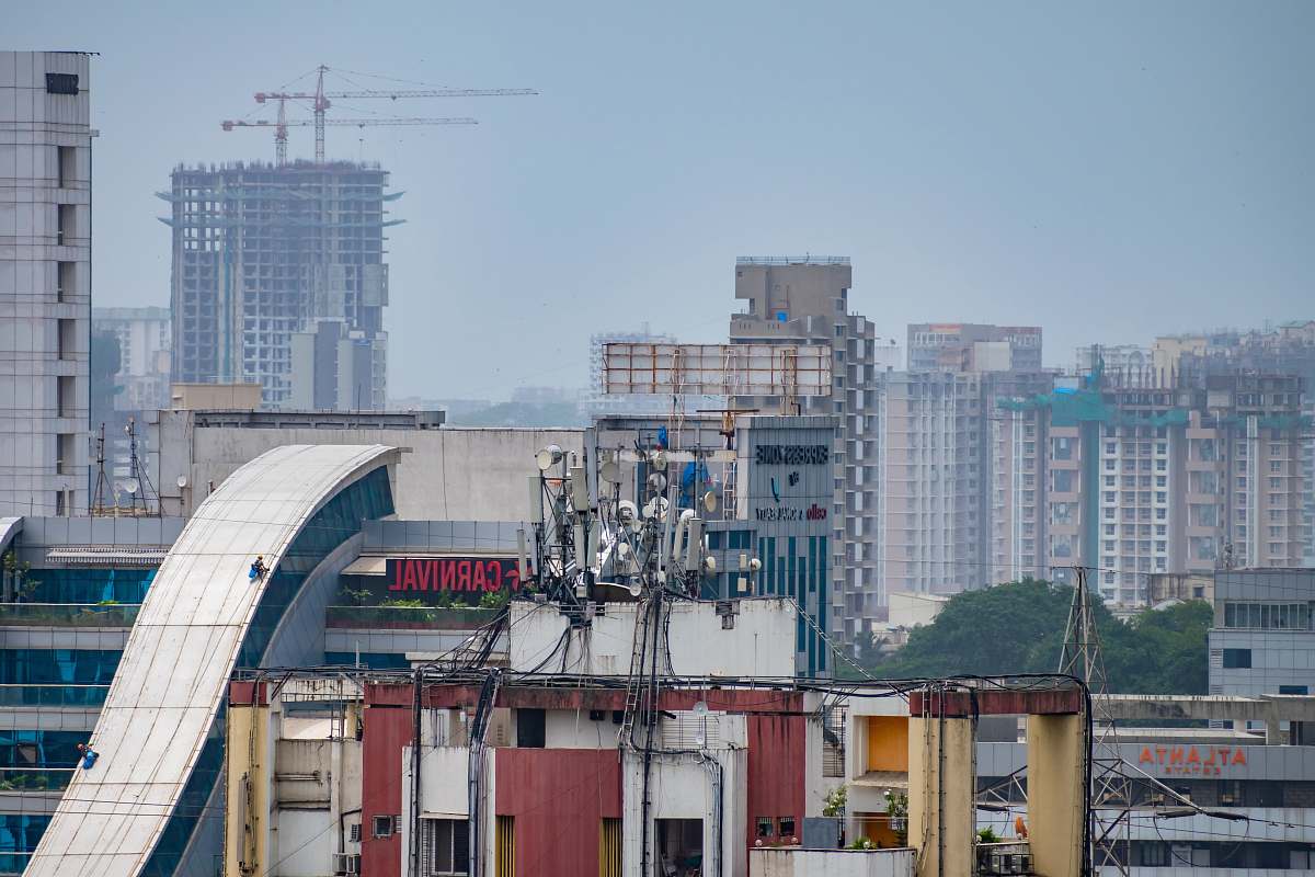 building aerial photo of concrete buildings metropolis