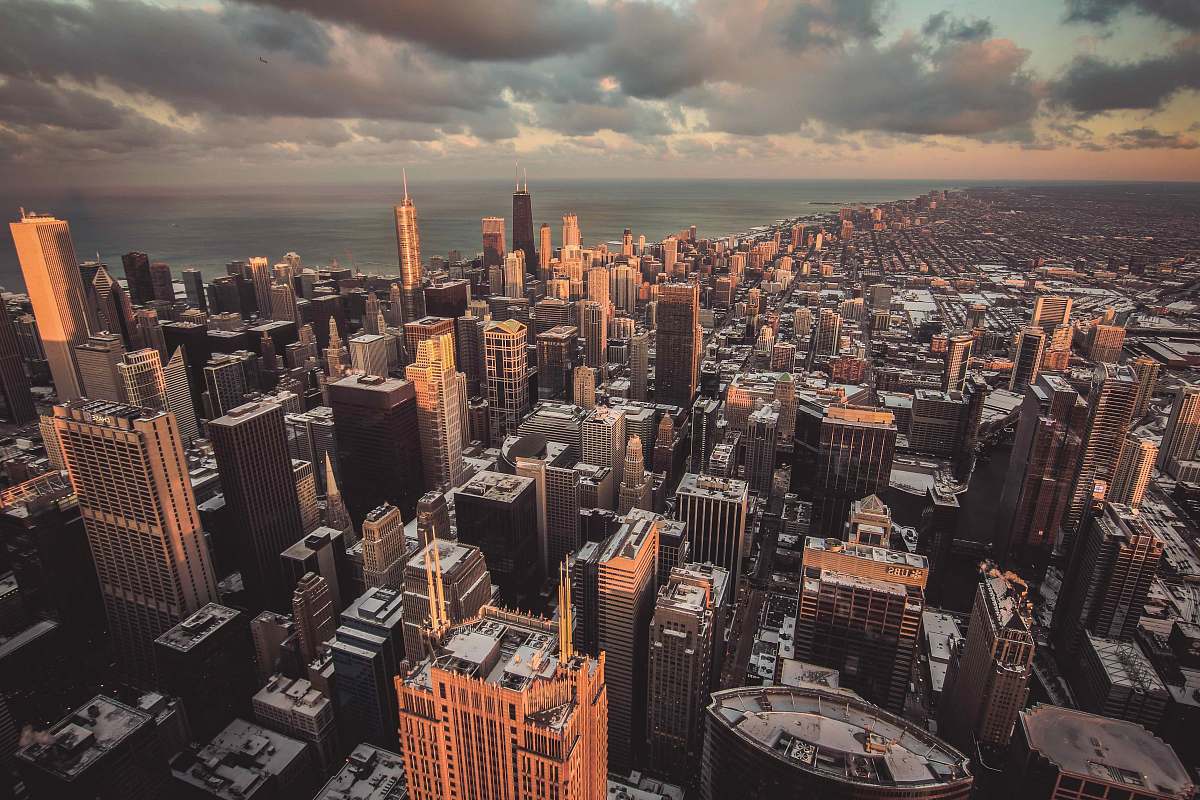 urban aerial photography of city buildings during cloudy sky skyscraper