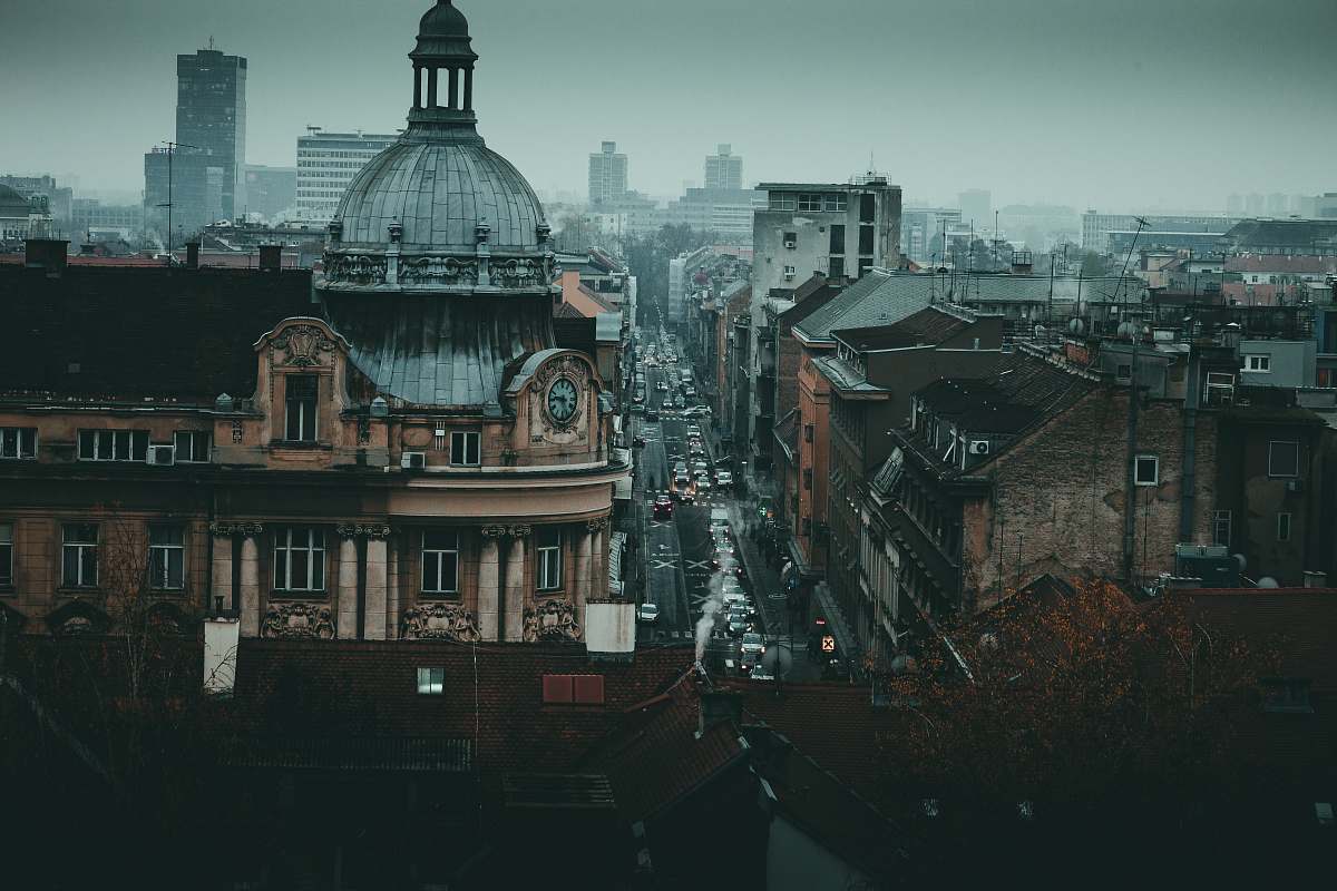 urban aerial photography of city with high-rise buildings and different cars on road metropolis