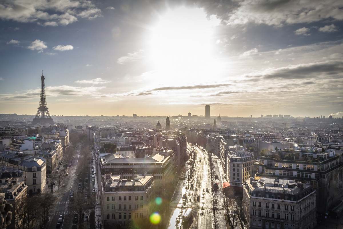 paris aerial view of city buildings sun