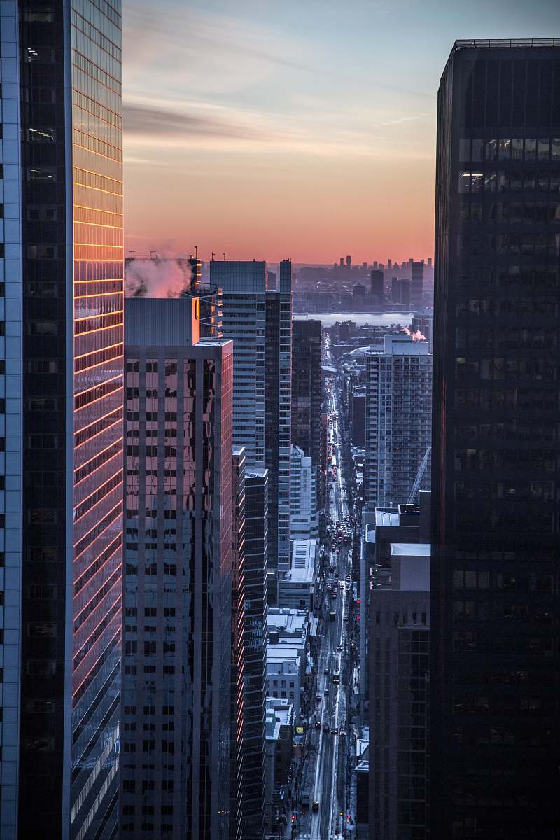 building aerial view of road between buildings android wallpapers