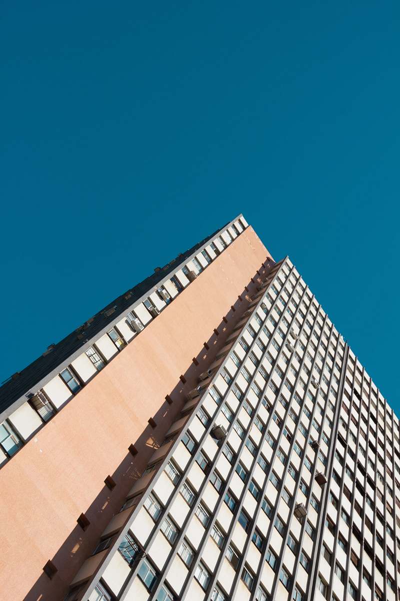 building architectural photography of white and pink building office building