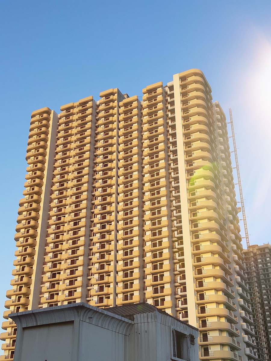 building beige high rise tenement building high rise
