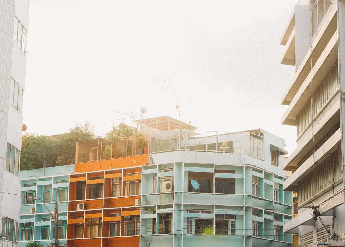 building blue and orange building high rise