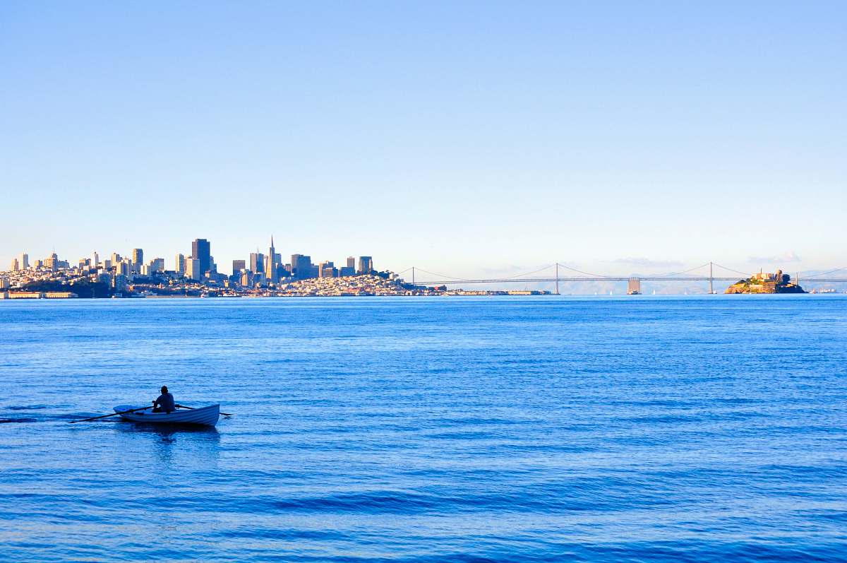 water boat near city building during daytime san francisco