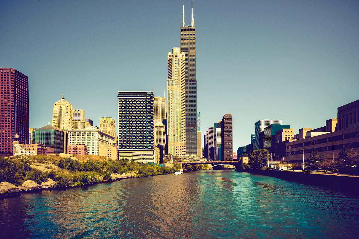 building body of water near buildings town