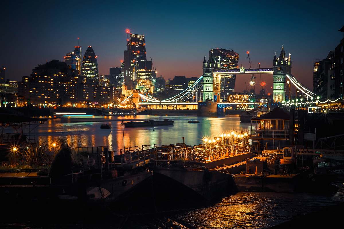 london bridge over body of water near buildings downtown