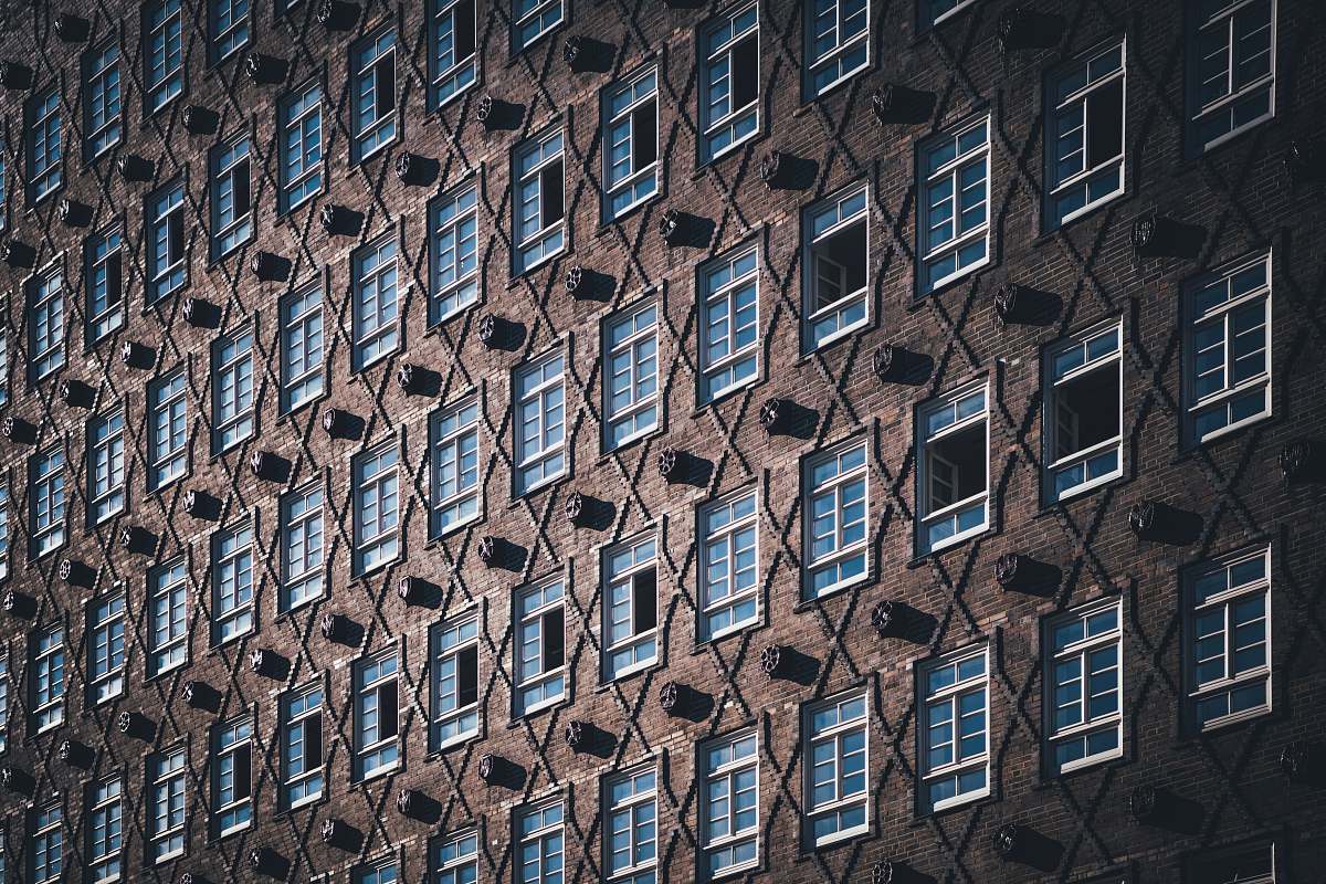 building brown and blue concrete building high rise