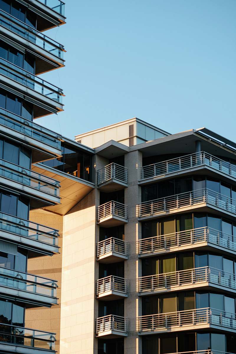 building brown and white high-rise building high rise