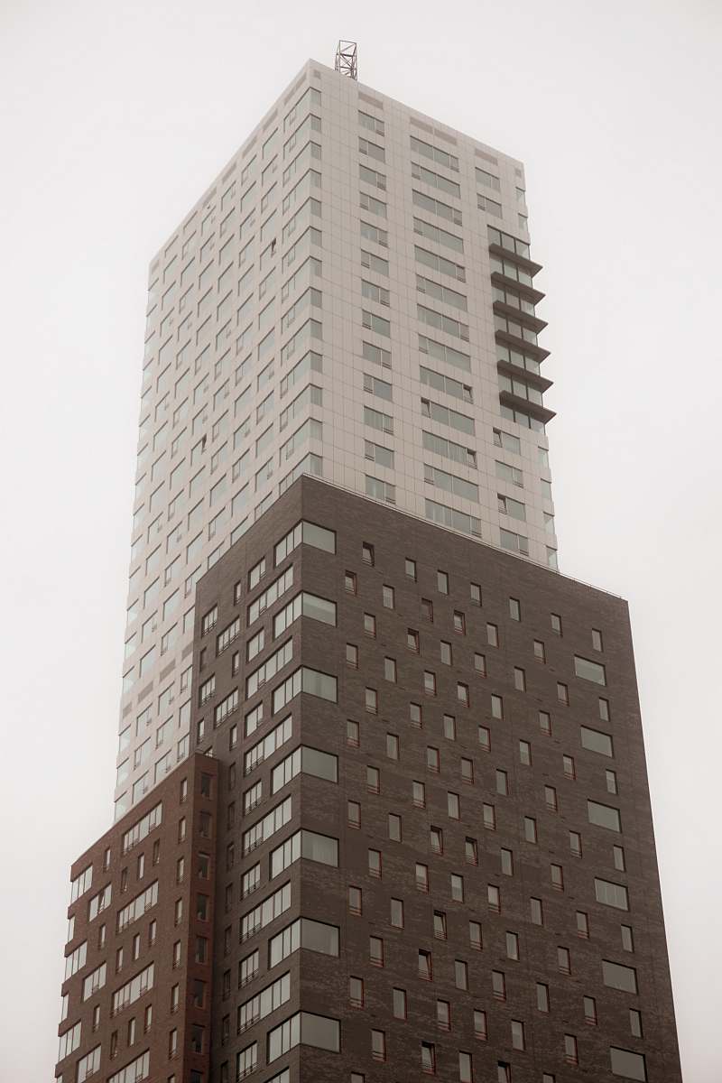 building brown and white painted building high rise
