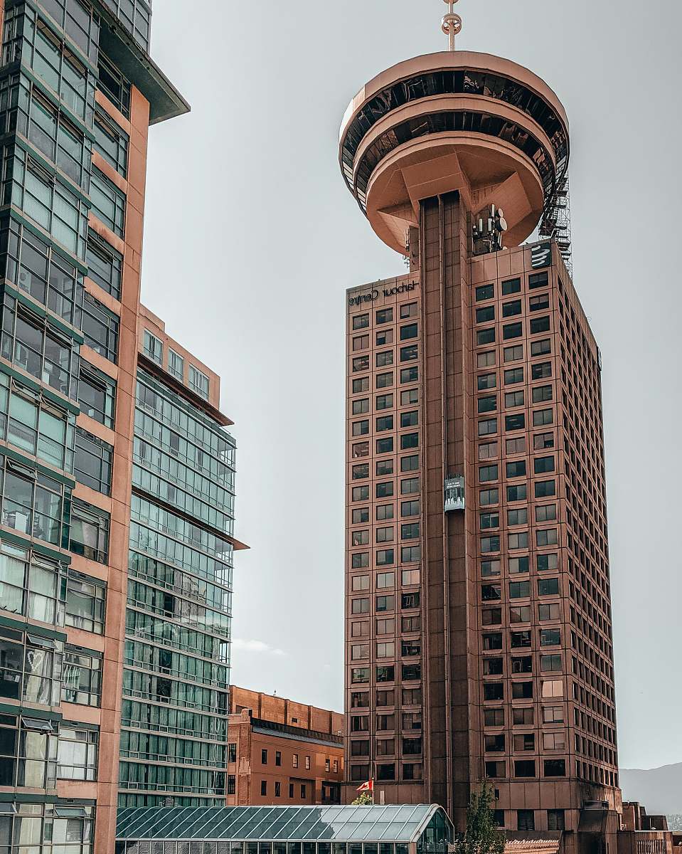 building brown concrete high-rise building condo
