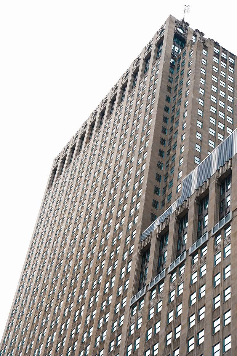 building brown concrete high-rise building during daytime urban