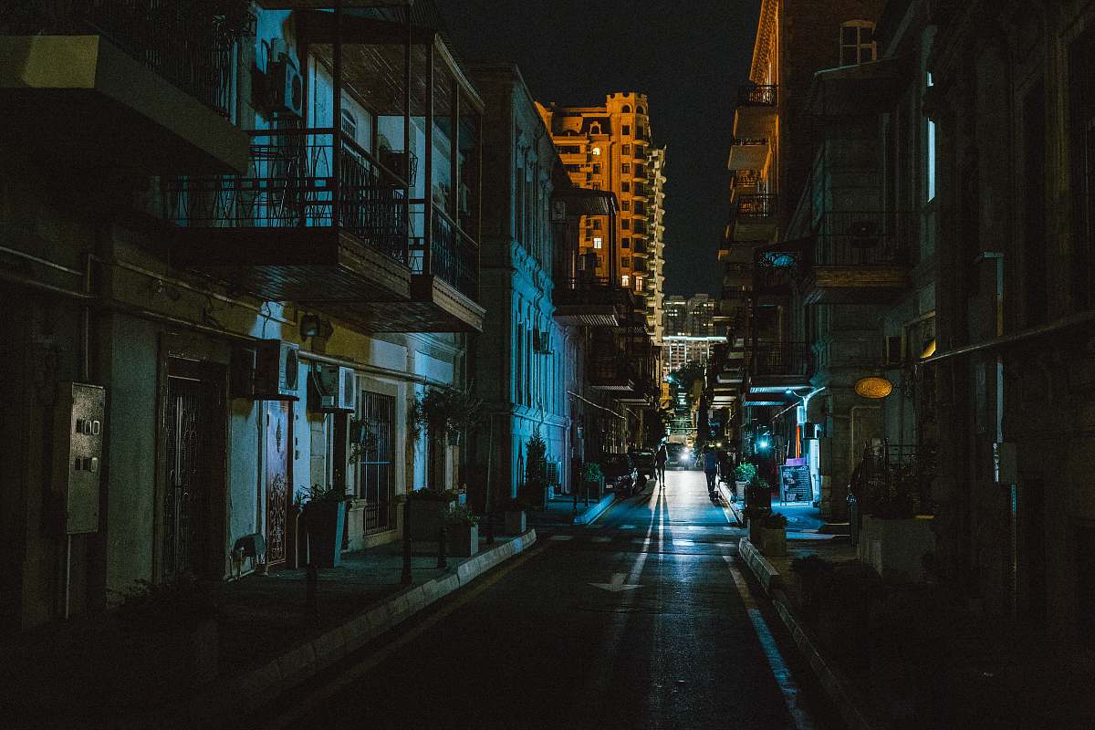 building buildings and road during night street