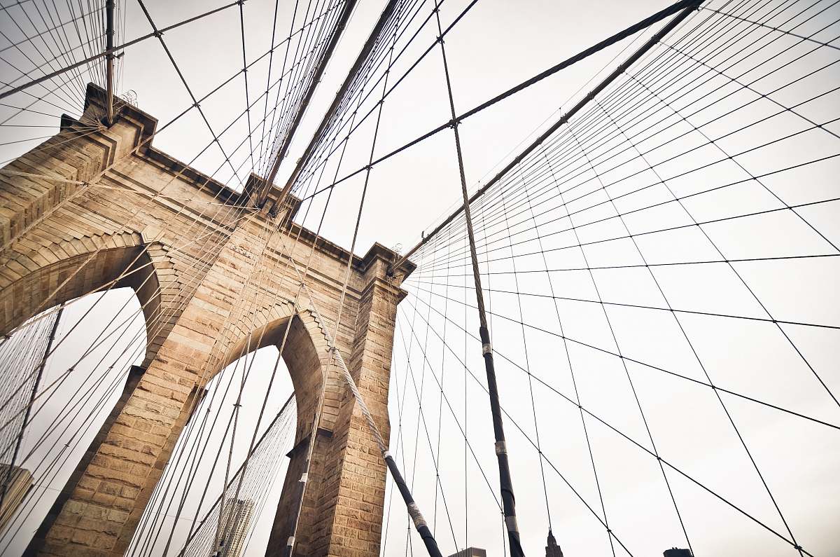 architecture cable bridge under white sky new york