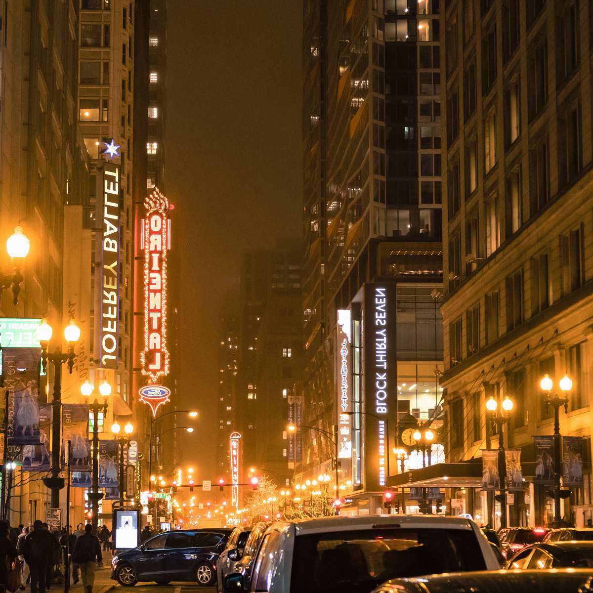 building cars on street during nighttime metropolis