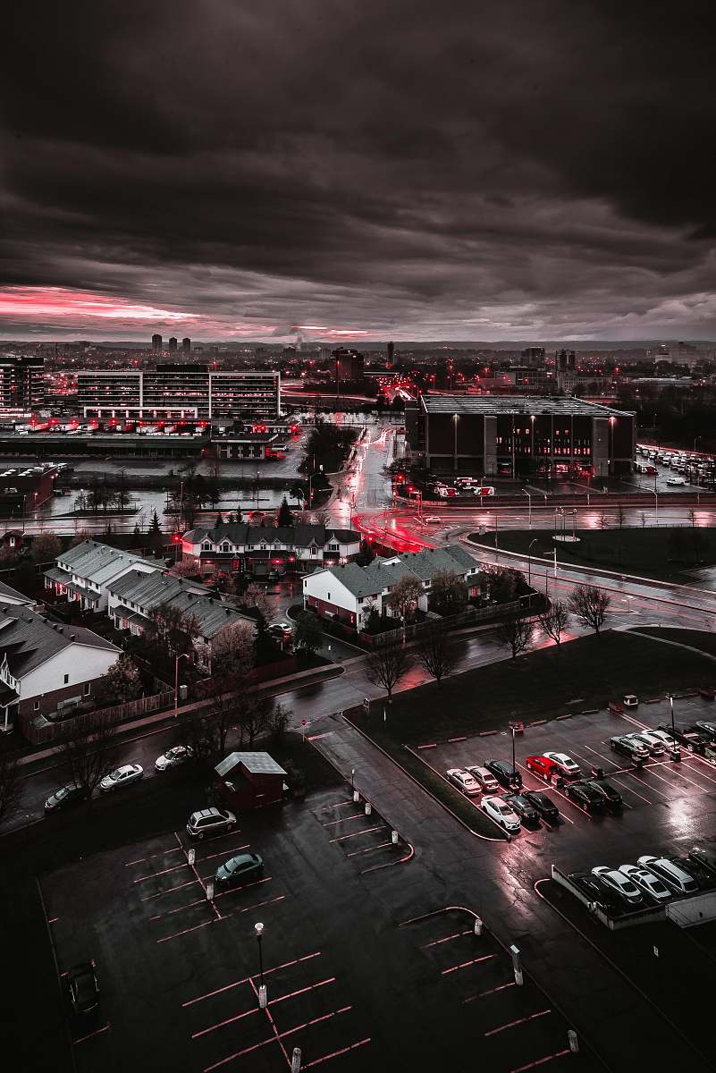 building city buildings and cars on grayscale photography urban