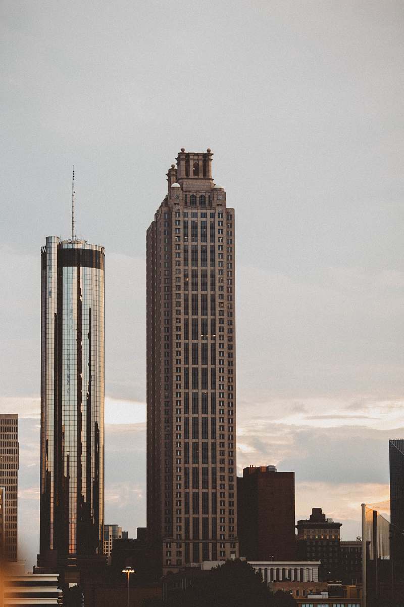 urban city buildings under cloudy sky during daytime building