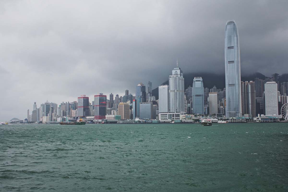 building city with high-rise buildings near sea grey