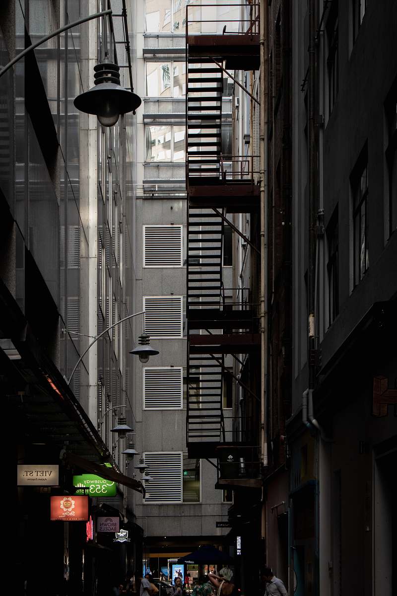 town close-up photography of high-rise building road