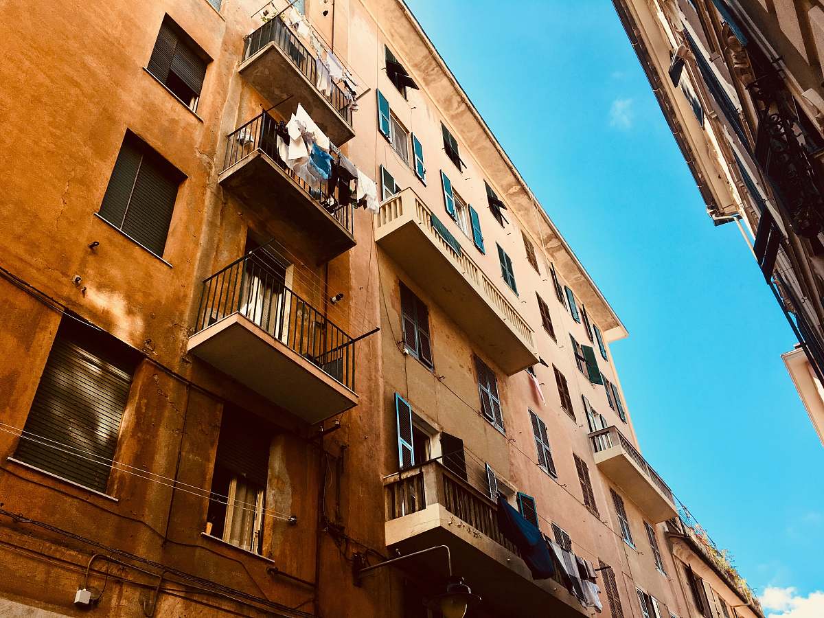 building clothes hanged at false balcony home decor