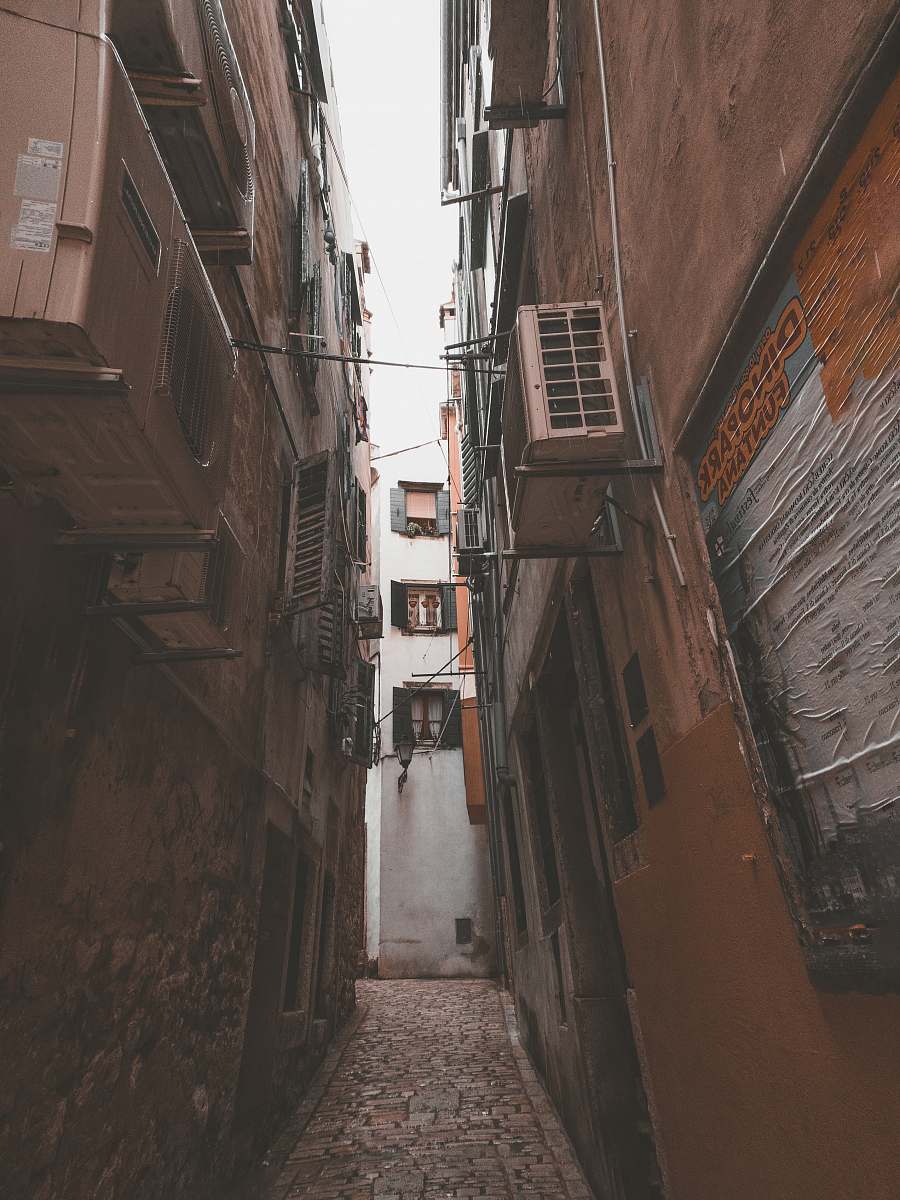 road empty alley during daytime building