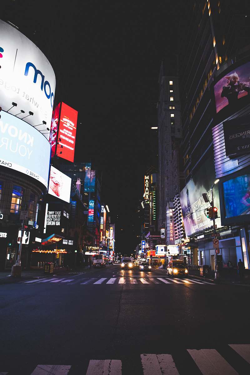 building empty city street during nighttime metropolis