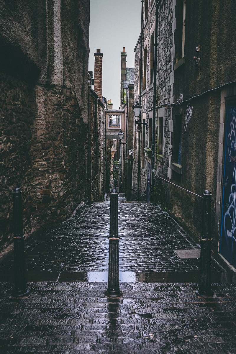 road empty pathway surrounded by buildings street