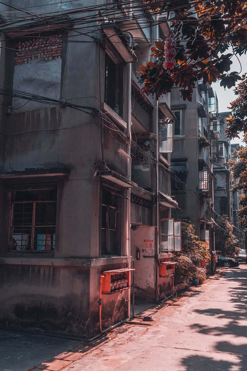 building gray and orange building road