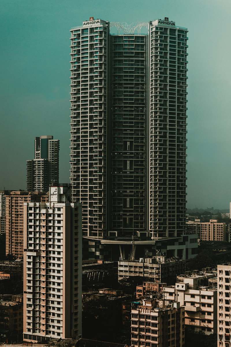 building gray high-rise buildings during daytime high rise