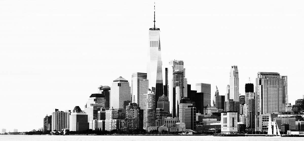 urban grayscale photo of high rise buildings across sea black-and-white