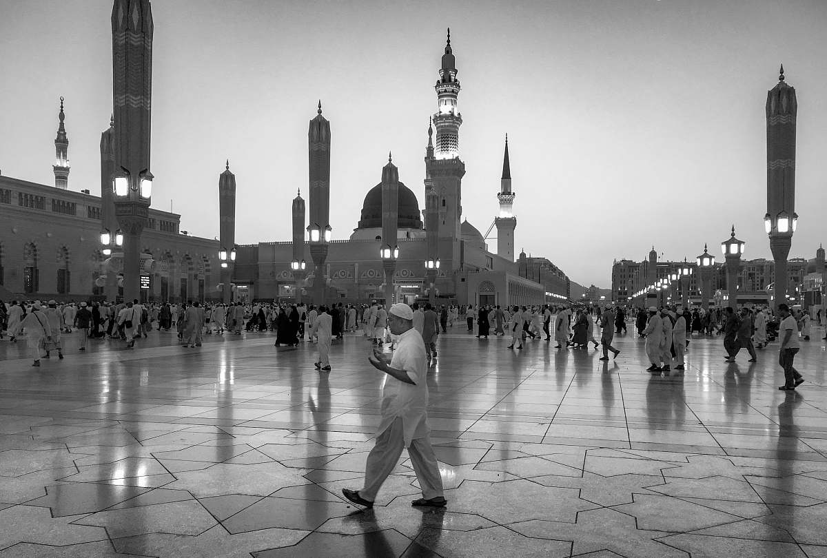 building grayscale photography of people on Mecca Sa black-and-white
