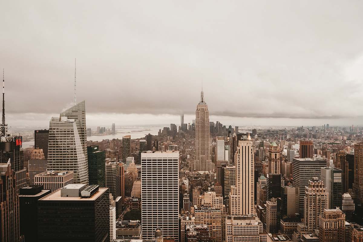 building grey concrete buildings during daytime high rise