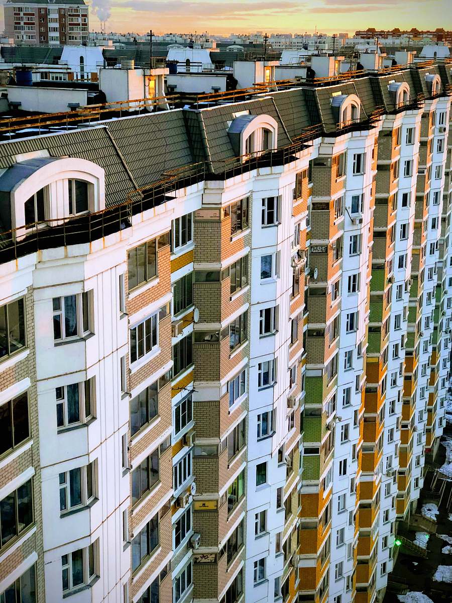 building high angle photography of white and brown high rise building during daytime high rise