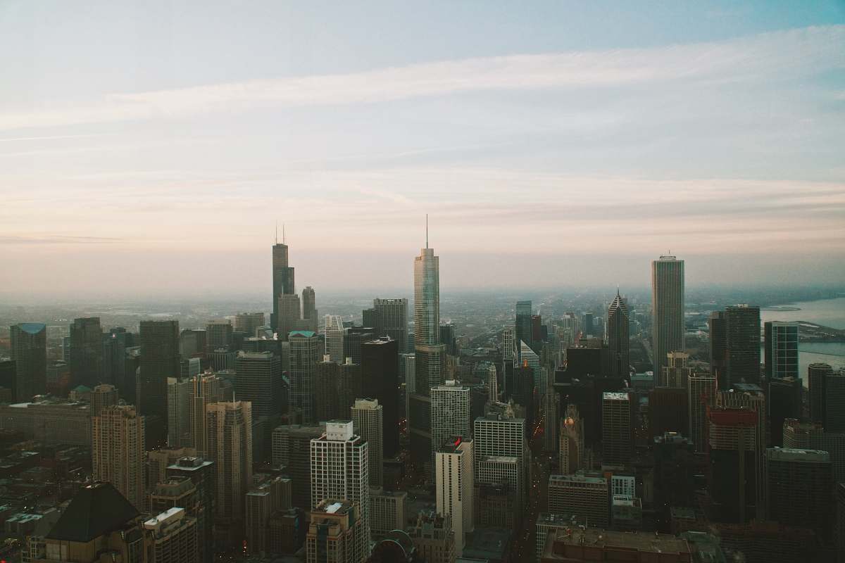 building high buildings under white sky at daytime nature