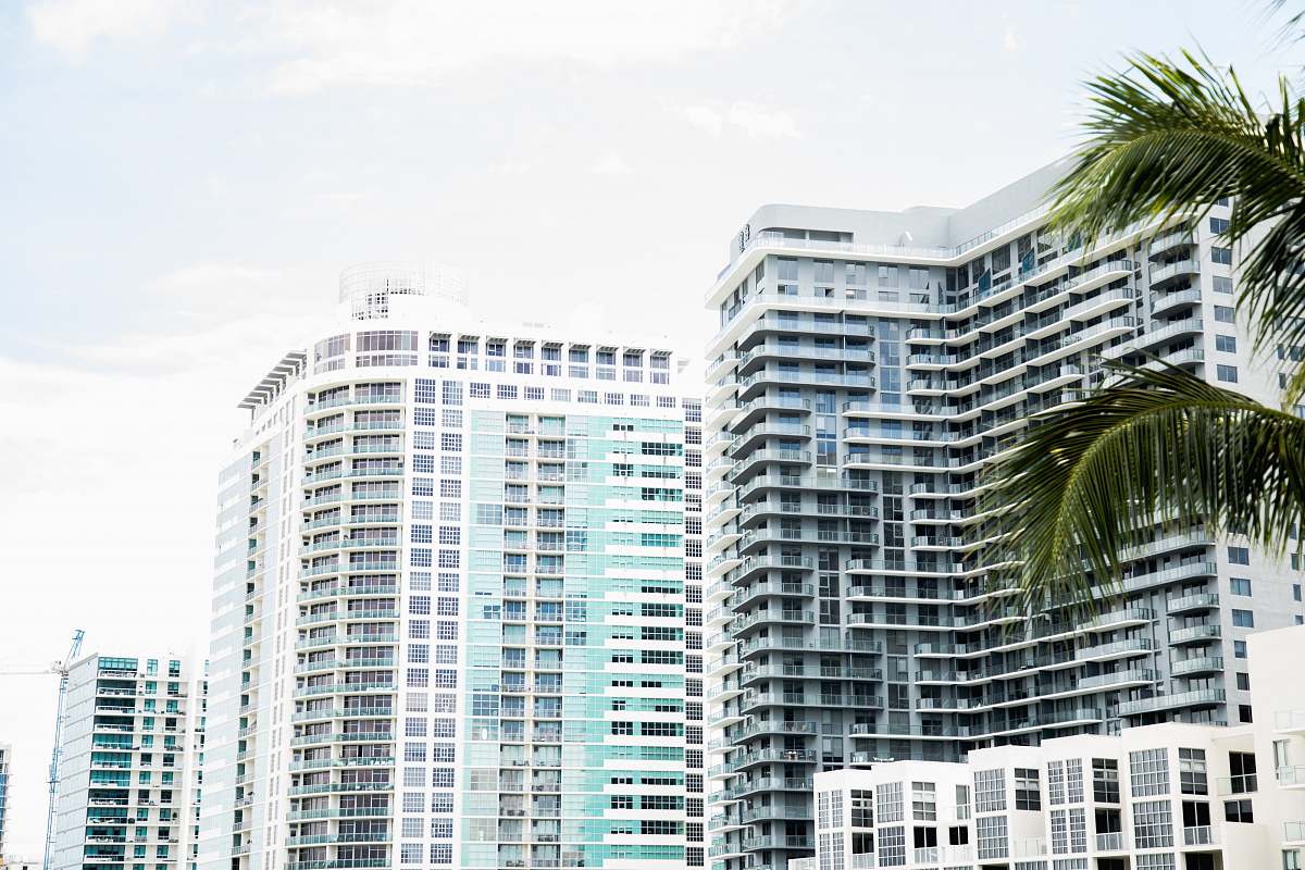 building high-rise building under white sky high rise