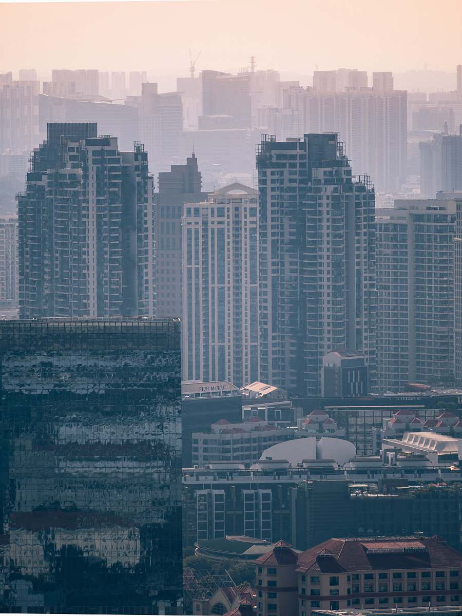 urban high rise buildings in grayscale photo metropolis
